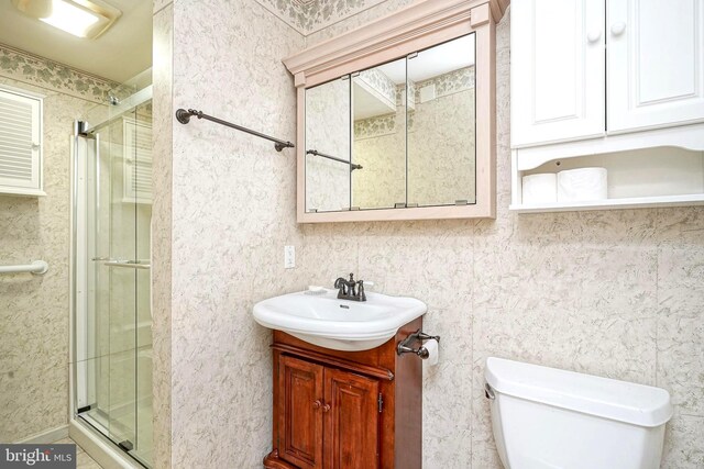 612 Howard Ave, Pitman, NJ 08071 - bathroom with a shower stall, toilet, and vanity
