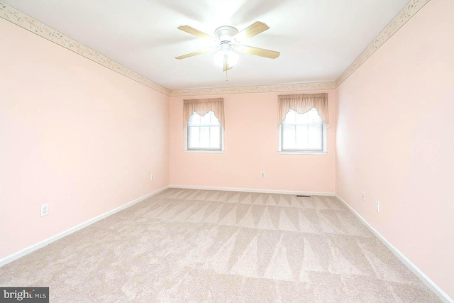612 Howard Ave, Pitman, NJ 08071 - unfurnished room featuring ceiling fan, light colored carpet, and baseboards