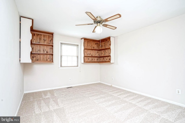 612 Howard Ave, Pitman, NJ 08071 - empty room featuring a ceiling fan, carpet, and baseboards