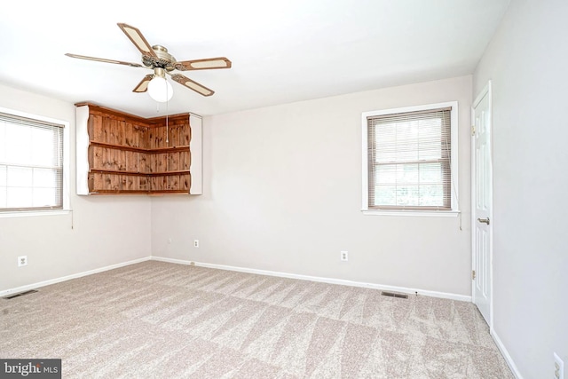 612 Howard Ave, Pitman, NJ 08071 - empty room featuring carpet floors, ceiling fan, and baseboards