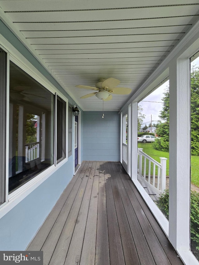 5934 Tilghman Island Rd, Tilghman, MD 21671 - wooden porch with ceiling fan