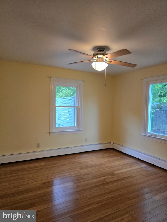 5934 Tilghman Island Rd, Tilghman, MD 21671 - spare room with wood finished floors and a ceiling fan