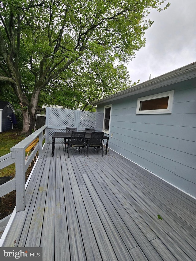 5934 Tilghman Island Rd, Tilghman, MD 21671 - wooden deck featuring outdoor dining space