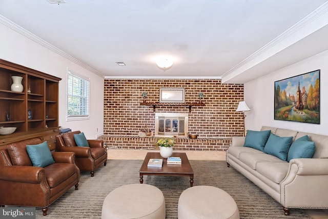 living room featuring crown molding and brick wall