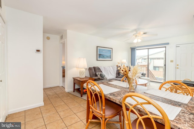 105 120th St Unit 87, Ocean City, MD 21842 - dining area with a ceiling fan, baseboards, and light tile patterned flooring
