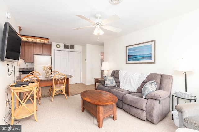105 120th St Unit 87, Ocean City, MD 21842 - living room with ceiling fan, light colored carpet, and light tile patterned floors