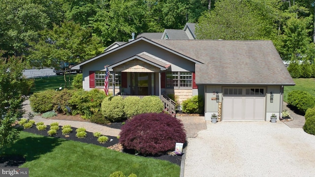 5 Fairway Ln, Ocean Pines, MD 21811 - view of front of property featuring driveway, a garage, a front yard, and roof with shingles