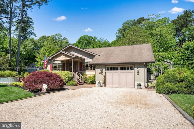 5 Fairway Ln, Ocean Pines, MD 21811 - single story home with a garage, driveway, covered porch, and roof with shingles