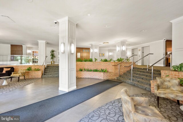 3000 Spout Run Pkwy Unit B606, Arlington, VA 22201 - lobby featuring stairs and brick wall