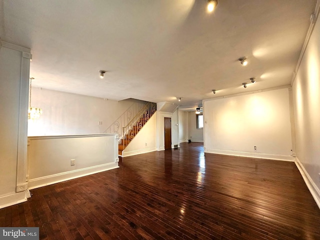 1506 N 13th St, Philadelphia, PA 19122 - unfurnished living room with ceiling fan, wood-type flooring, a chandelier, stairs, and baseboards