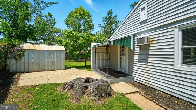 1802 Kittyhawk Rd, Baltimore, MD 21221 - view of yard with a patio, an outbuilding, and cooling unit