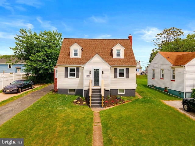 1208 Krueger Ave, Rosedale, MD 21237 - cape cod-style house with a chimney
