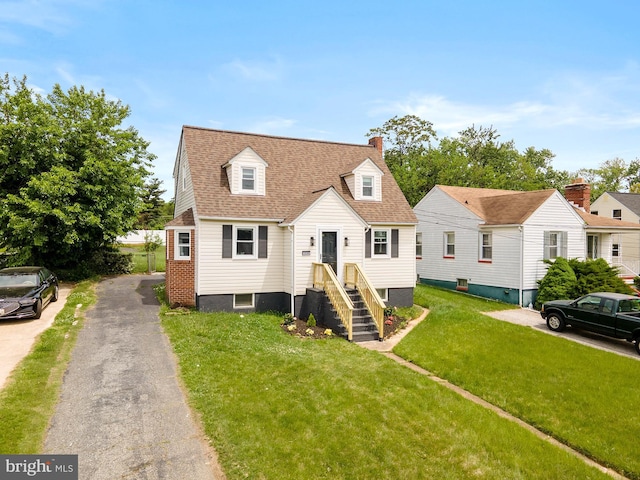 1208 Krueger Ave, Rosedale, MD 21237 - cape cod-style house featuring a front lawn, a chimney, and a shingled roof
