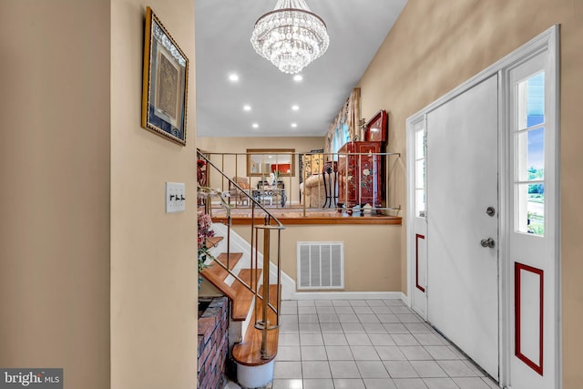 foyer with a chandelier, stairway, tile patterned floors, baseboards, and recessed lighting