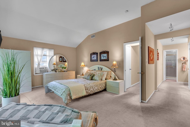 carpeted bedroom with baseboards, vaulted ceiling, and cooling unit