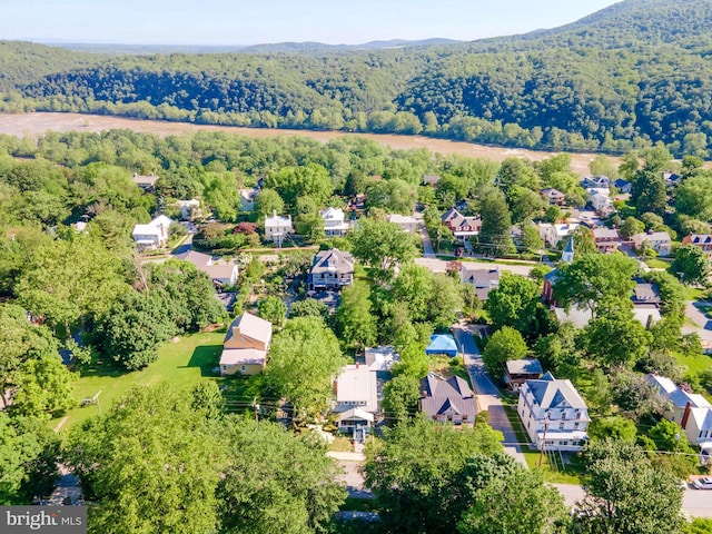730 Fillmore St, Harpers Ferry, WV 25425 - aerial perspective of suburban area featuring a heavily wooded area and mountains