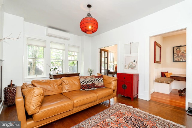 730 Fillmore St, Harpers Ferry, WV 25425 - living room featuring a wall mounted AC and wood finished floors