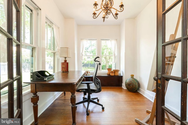 730 Fillmore St, Harpers Ferry, WV 25425 - home office with hardwood / wood-style flooring, a chandelier, and baseboards