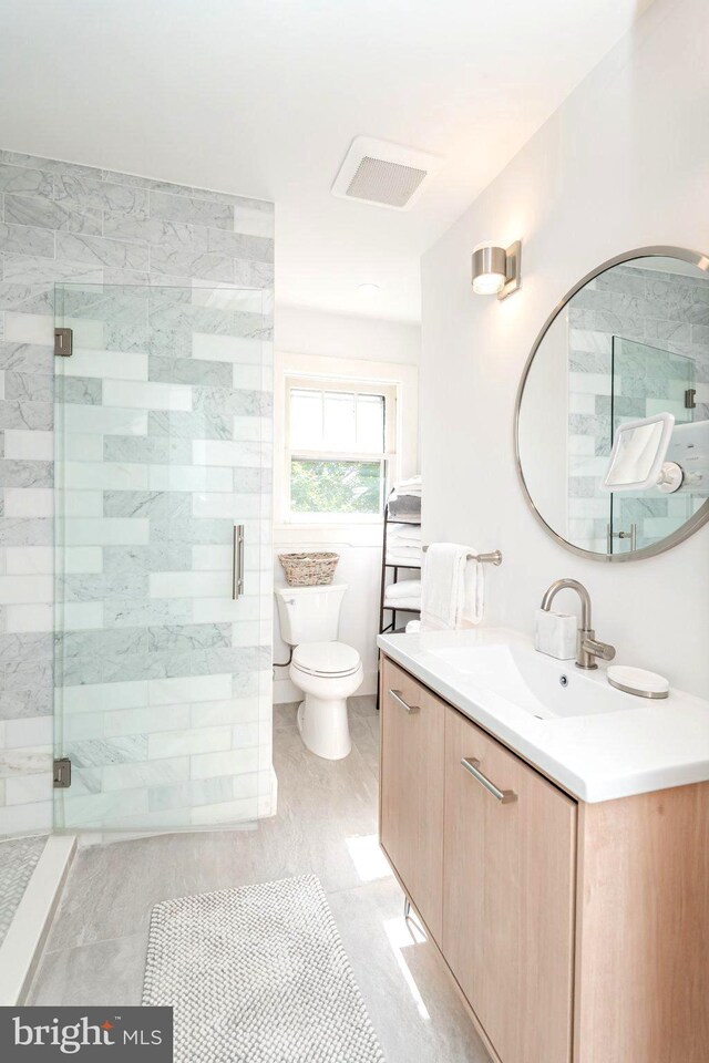 730 Fillmore St, Harpers Ferry, WV 25425 - bathroom featuring vanity, a shower stall, and toilet