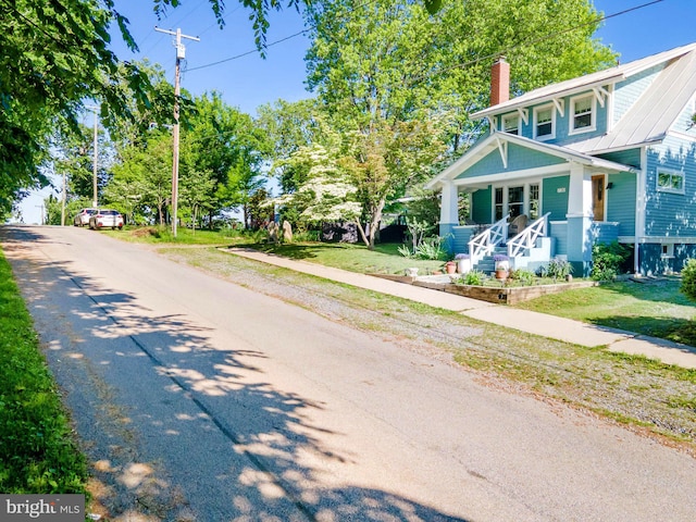 730 Fillmore St, Harpers Ferry, WV 25425 - view of front of home featuring a chimney and a porch