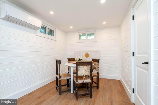 730 Fillmore St, Harpers Ferry, WV 25425 - dining area featuring a wall unit AC, wooden walls, light wood-style floors, and recessed lighting
