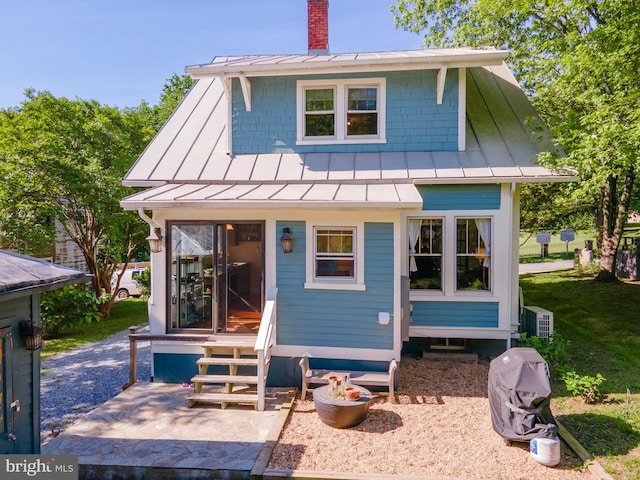 730 Fillmore St, Harpers Ferry, WV 25425 - view of front of property featuring a standing seam roof, a chimney, and metal roof