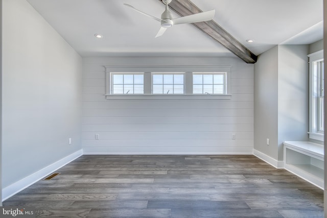 1306 N Barnegat Ave, Surf City, NJ 08008 - unfurnished room featuring plenty of natural light, beam ceiling, baseboards, a ceiling fan, and recessed lighting