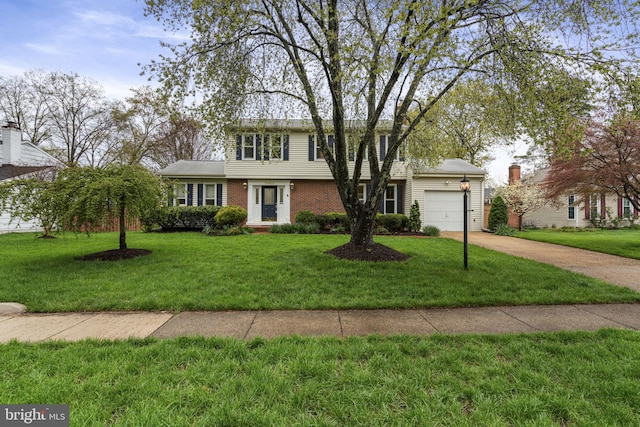 14906 Cranoke St, Centreville, VA 20120 - colonial-style house with a garage, driveway, a front lawn, and brick siding