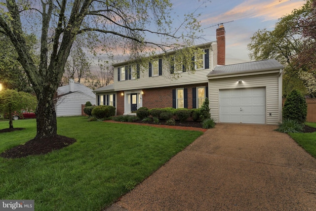 14906 Cranoke St, Centreville, VA 20120 - colonial inspired home featuring a garage, a lawn, a chimney, driveway, and brick siding