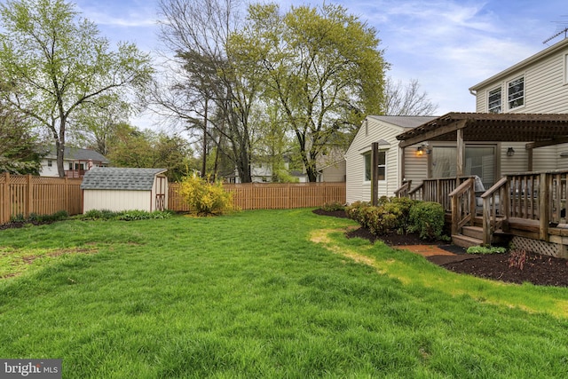 14906 Cranoke St, Centreville, VA 20120 - view of yard with a storage unit, a deck, an outdoor structure, and a pergola