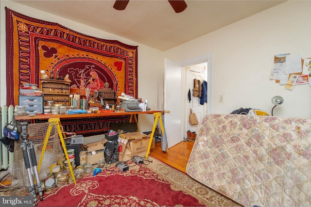 bedroom with wood finished floors