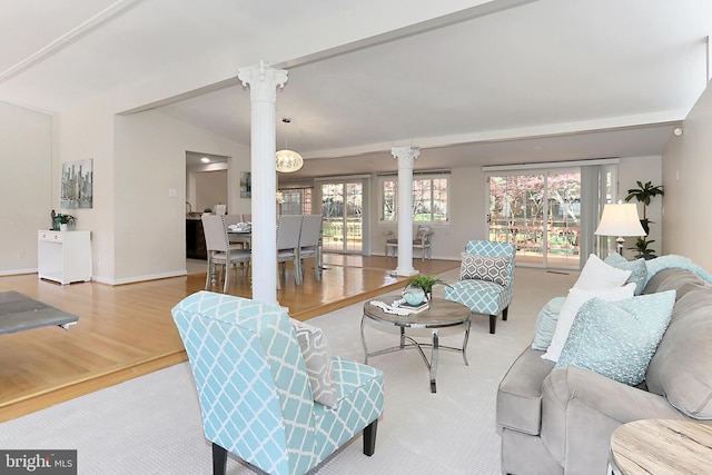 4124 Watkins Trl, Annandale, VA 22003 - living area featuring ornate columns, baseboards, wood finished floors, and vaulted ceiling