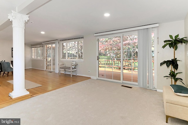 4124 Watkins Trl, Annandale, VA 22003 - carpeted living area featuring decorative columns, recessed lighting, baseboards, and wood finished floors