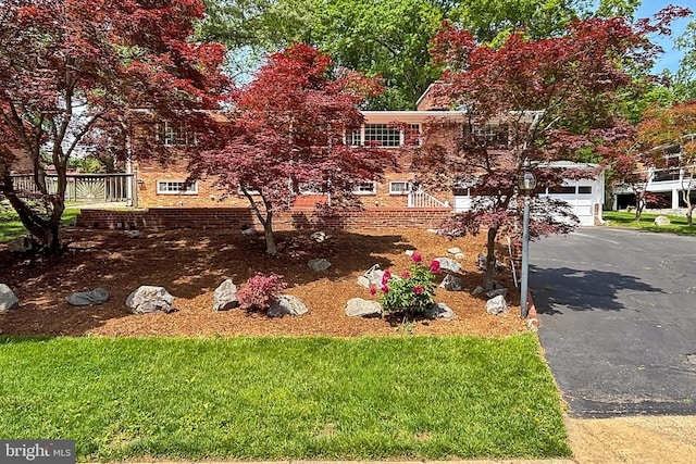 4124 Watkins Trl, Annandale, VA 22003 - view of property hidden behind natural elements featuring driveway and brick siding