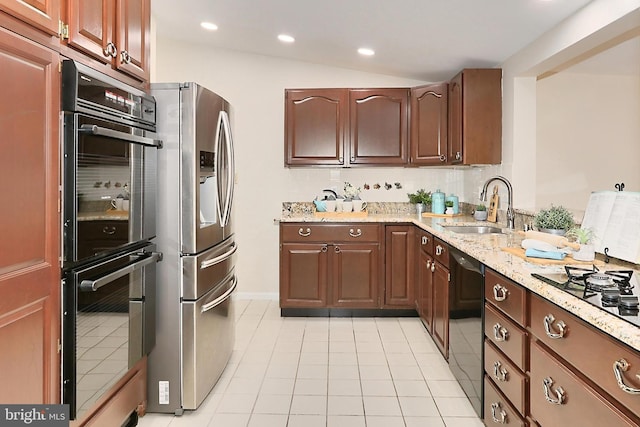 4124 Watkins Trl, Annandale, VA 22003 - kitchen featuring a sink, black appliances, light tile patterned flooring, light stone counters, and recessed lighting