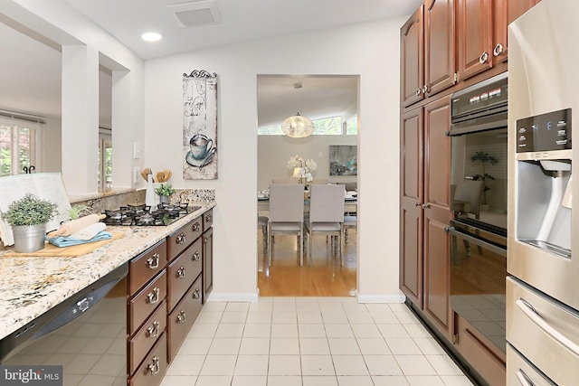 4124 Watkins Trl, Annandale, VA 22003 - kitchen featuring black appliances, baseboards, recessed lighting, and light stone countertops
