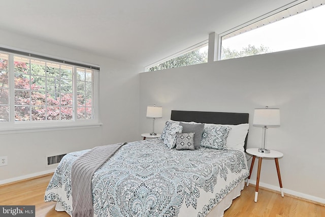 4124 Watkins Trl, Annandale, VA 22003 - bedroom featuring wood finished floors, baseboards, and vaulted ceiling