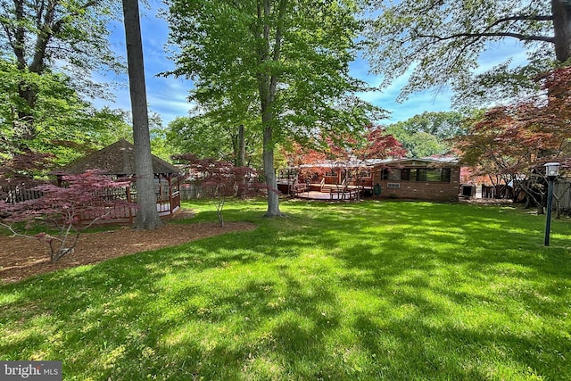 4124 Watkins Trl, Annandale, VA 22003 - view of grassy yard with a wooden deck