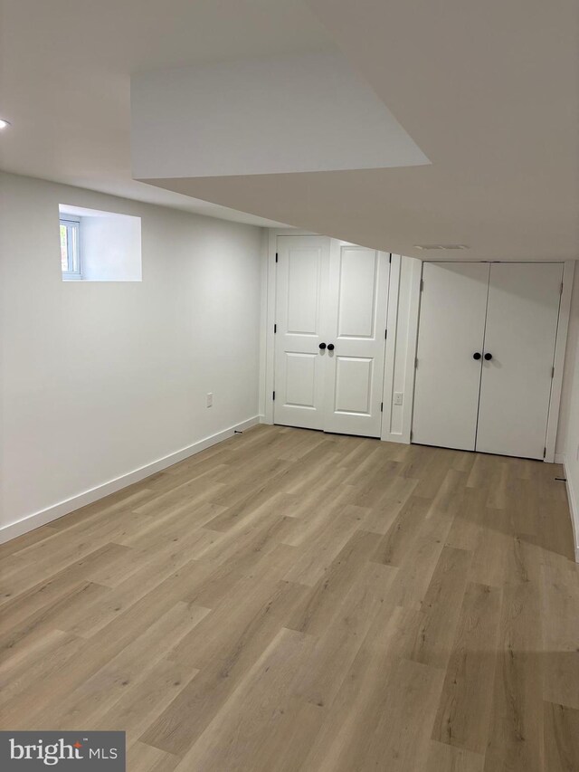 2506 Chelsea Ter, Baltimore, MD 21216 - basement featuring light wood finished floors and baseboards