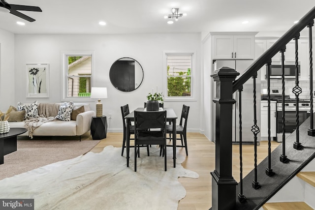 2506 Chelsea Ter, Baltimore, MD 21216 - dining space with plenty of natural light, stairs, light wood finished floors, and recessed lighting
