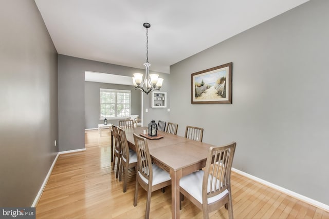 2307 Springdale Ln, Waldorf, MD 20603 - dining area featuring light wood-type flooring and a chandelier