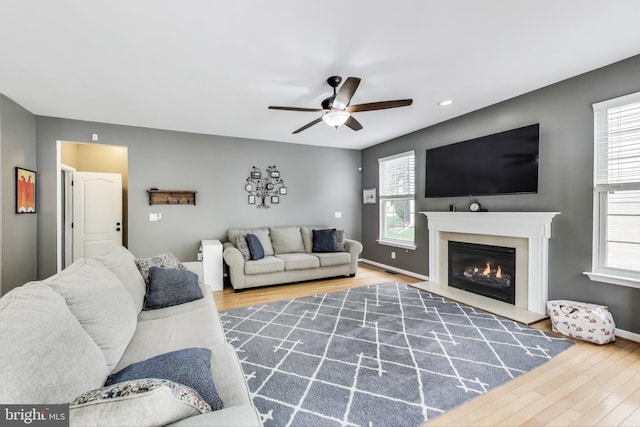 2307 Springdale Ln, Waldorf, MD 20603 - living area with a ceiling fan, wood finished floors, a glass covered fireplace, and recessed lighting