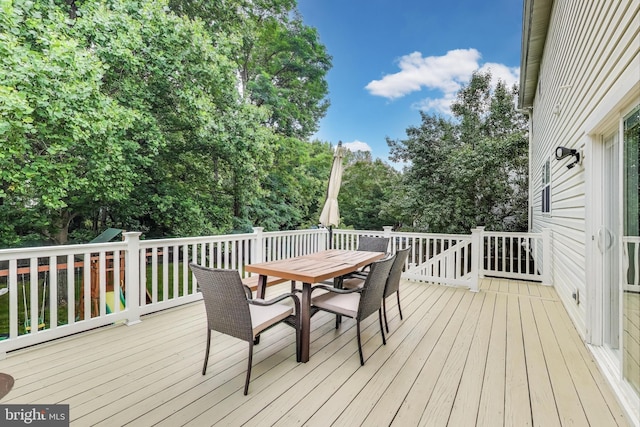 2307 Springdale Ln, Waldorf, MD 20603 - wooden terrace with outdoor dining area and view of scattered trees