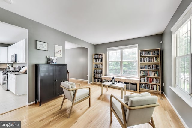 2307 Springdale Ln, Waldorf, MD 20603 - sitting room with healthy amount of natural light and light wood-type flooring