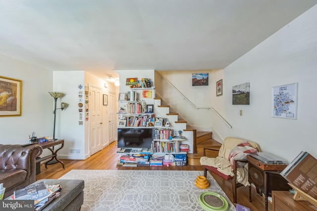 2217 Observatory Pl NW, Washington, DC 20007 - living room with wood finished floors, stairs, and baseboards