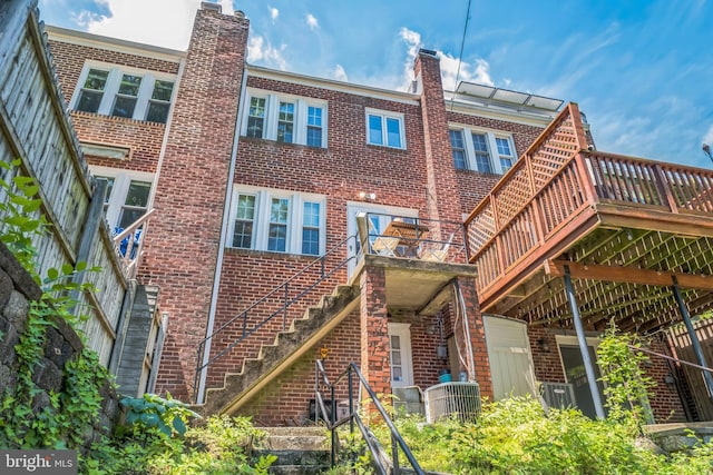 2217 Observatory Pl NW, Washington, DC 20007 - back of property with brick siding and a chimney