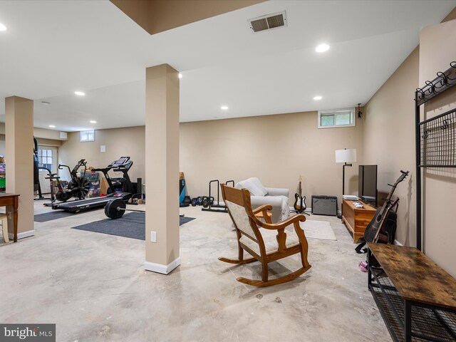 exercise area featuring recessed lighting and baseboards
