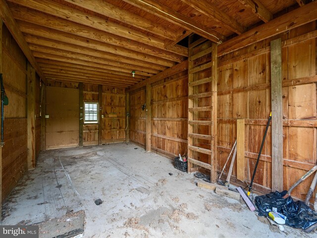 misc room with a garage
