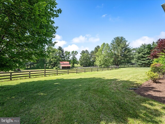 view of yard featuring a view of countryside