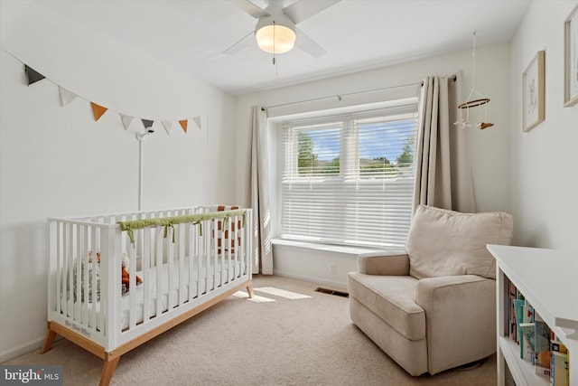 2000 Eton Ct Unit 2000, West Chester, PA 19382 - bedroom featuring a nursery area, carpet, baseboards, and ceiling fan